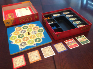 all of the typical components of the standard Settlers of Catan board game are present including every resource card, development cards, reference cards and meeples